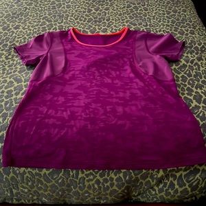 LuLulemon fushia color shirt with orange trim around neckline size 6 or 8